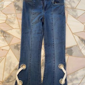 Bell bottom, side lace up, boot cut jean.